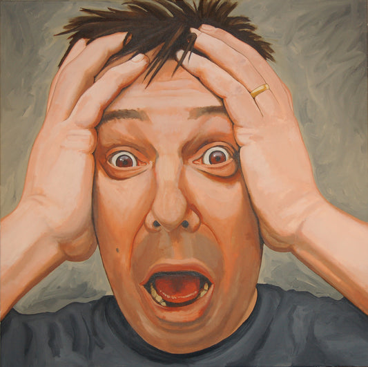A self portrait holding head in shock.