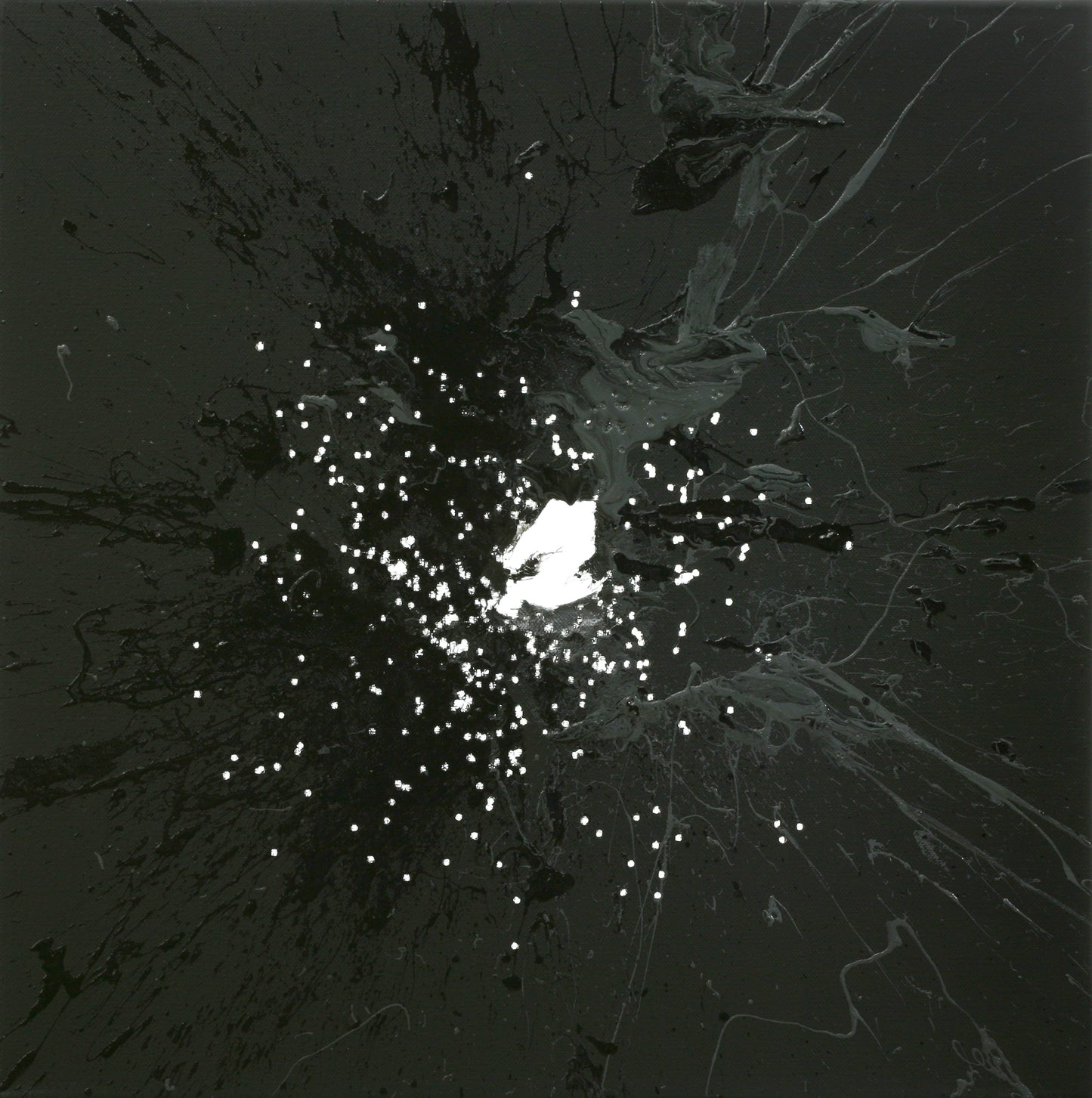 Light and dark grey applied to a grey background with ashotgun.